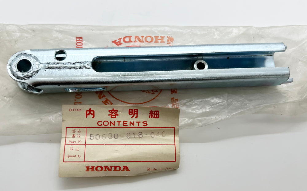 NOS Honda early 1970 US90 RH foot peg # 50630-918-040
